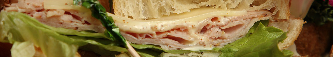Eating Sandwich Salad at Riverwalk Cafe and Oyster Bar restaurant in Stuart, FL.